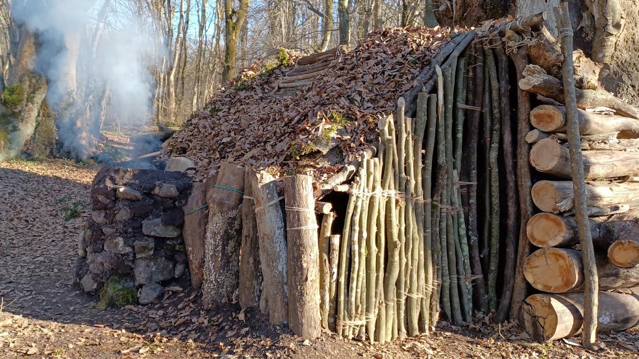 Building complete and warm survival shelter - Bushcraft house, Waterproof roof & Fireplace with dirt