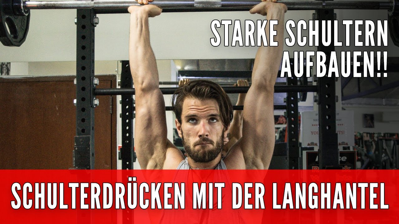 Schulterdrücken mit der Langhantel im Stehen
