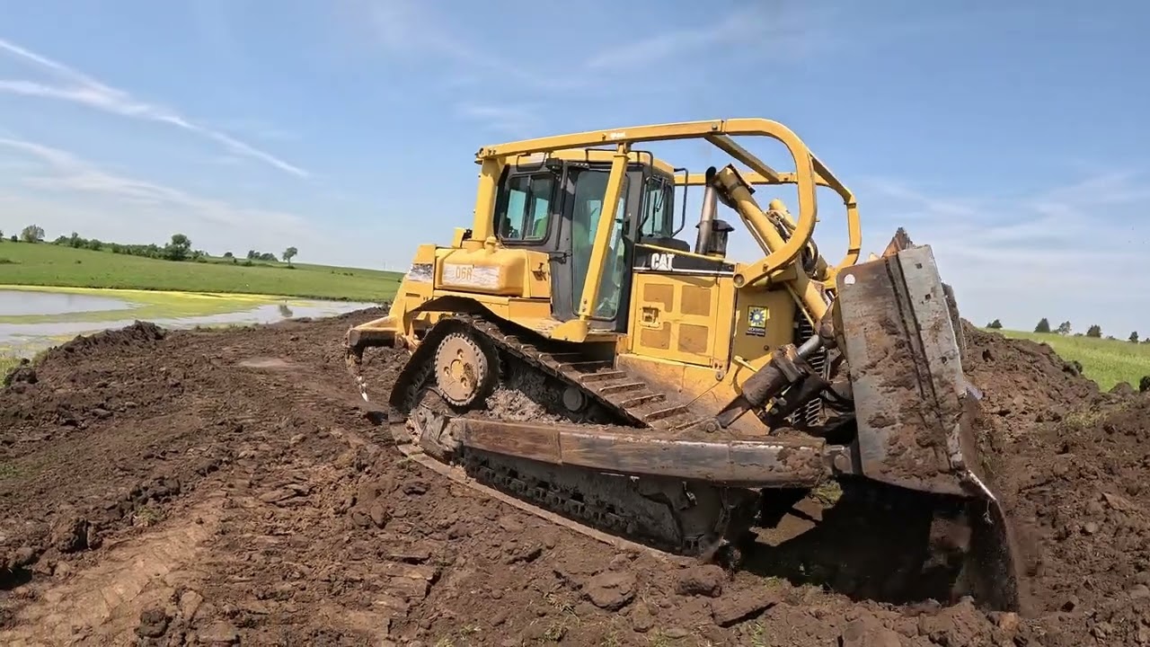 Cat Pan Scrapers and Dozer – Pond Dam Repair