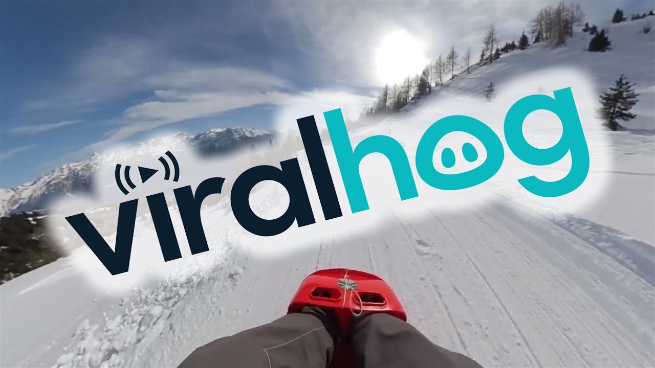 Breathtaking Descent in a Snow Toboggan || ViralHog