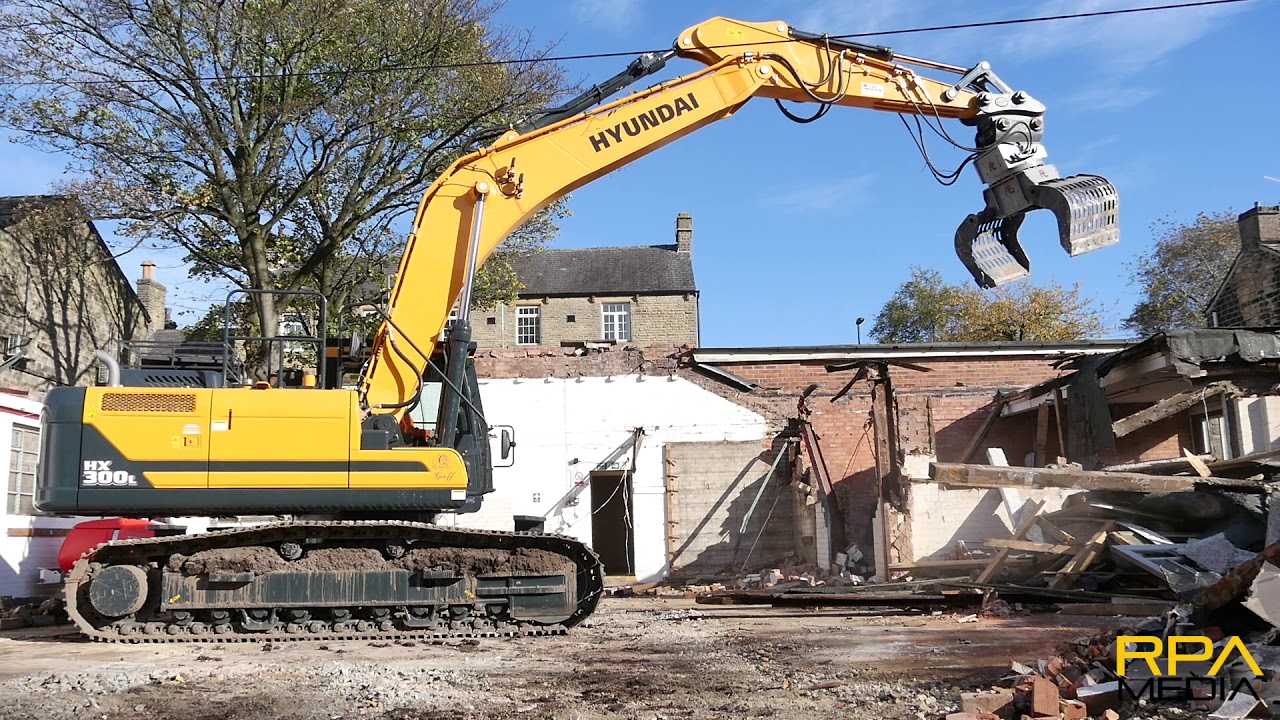NEW Hyundai HX300 excavator with Pladdet sorting grab on demolition work.