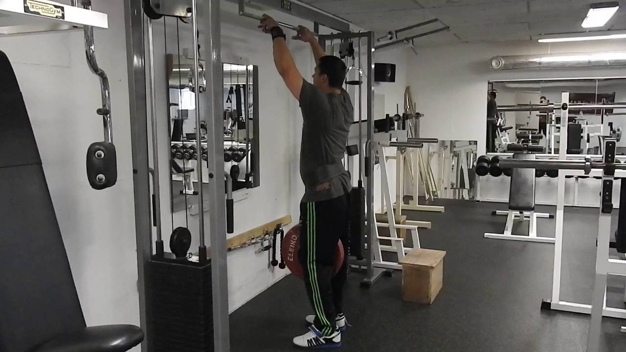 One finger pull ups with 30 kg extra weight
