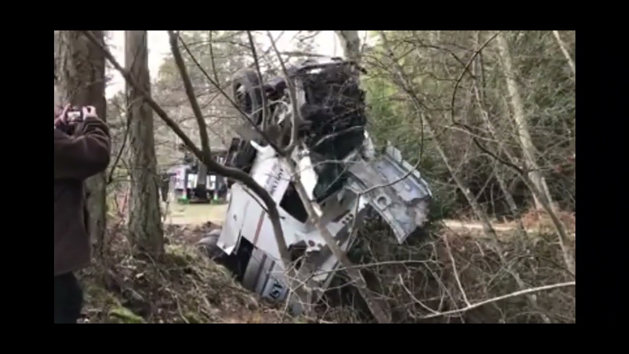 Heavy Duty towing Recovery chip truck upside in small creek