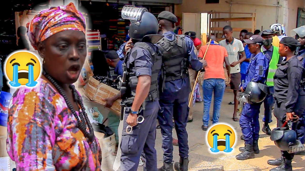 Lady Cries as the Police Demolish Illegal Structures in Banjul
