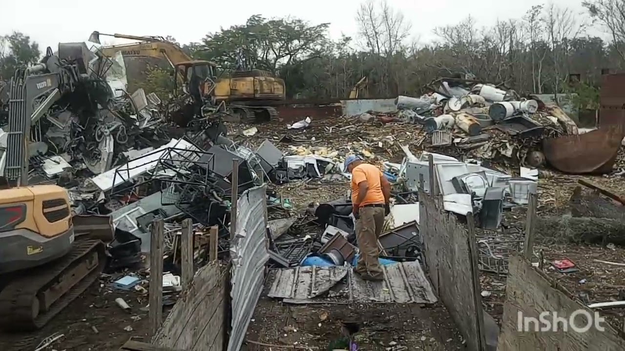 Unloading the scrap trailer  Recycling @ Marty's 