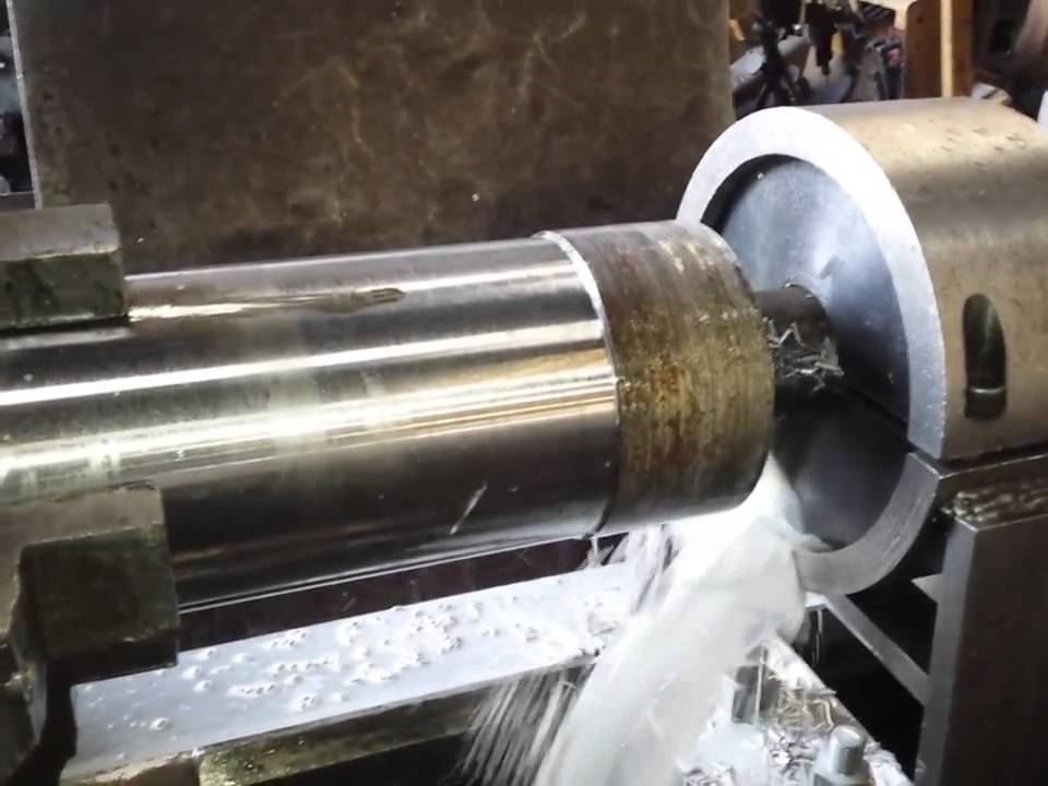 trepanning 3.25" hole thru 25" long EN24T steel bar.