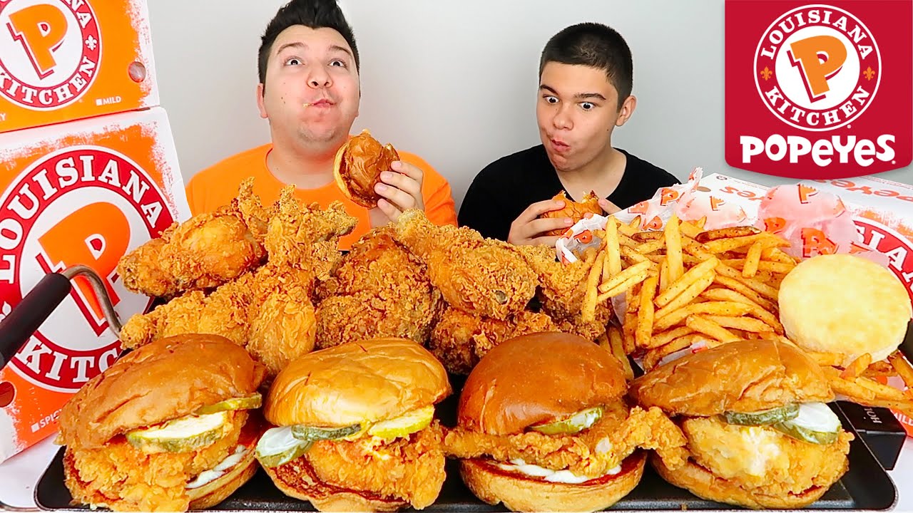 My Little Brother Tries Popeyes Spicy Chicken Sandwich For The First Time • MUKBANG