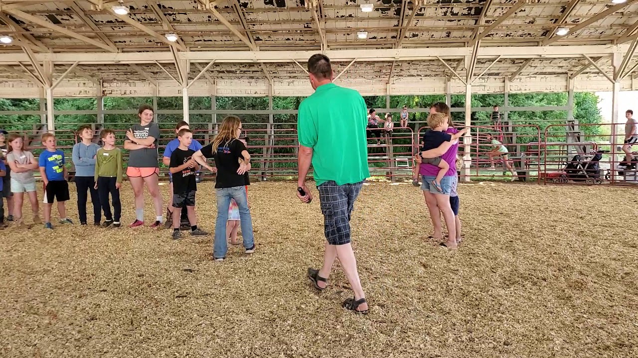 Lauren (#5) @ Johnson County Fair rooster crowing contest... SHE WON!