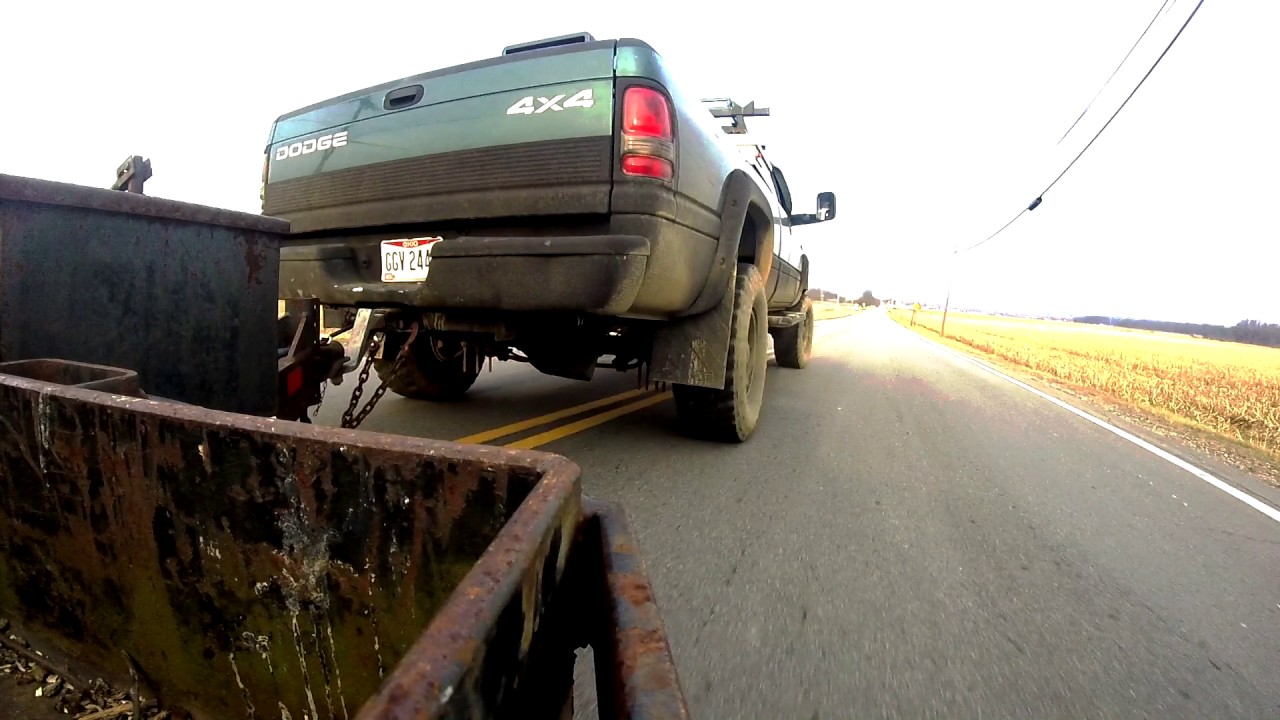 24 Valve 5 Speed Cummins Pulling a Trailer 5 Inch Exhaust