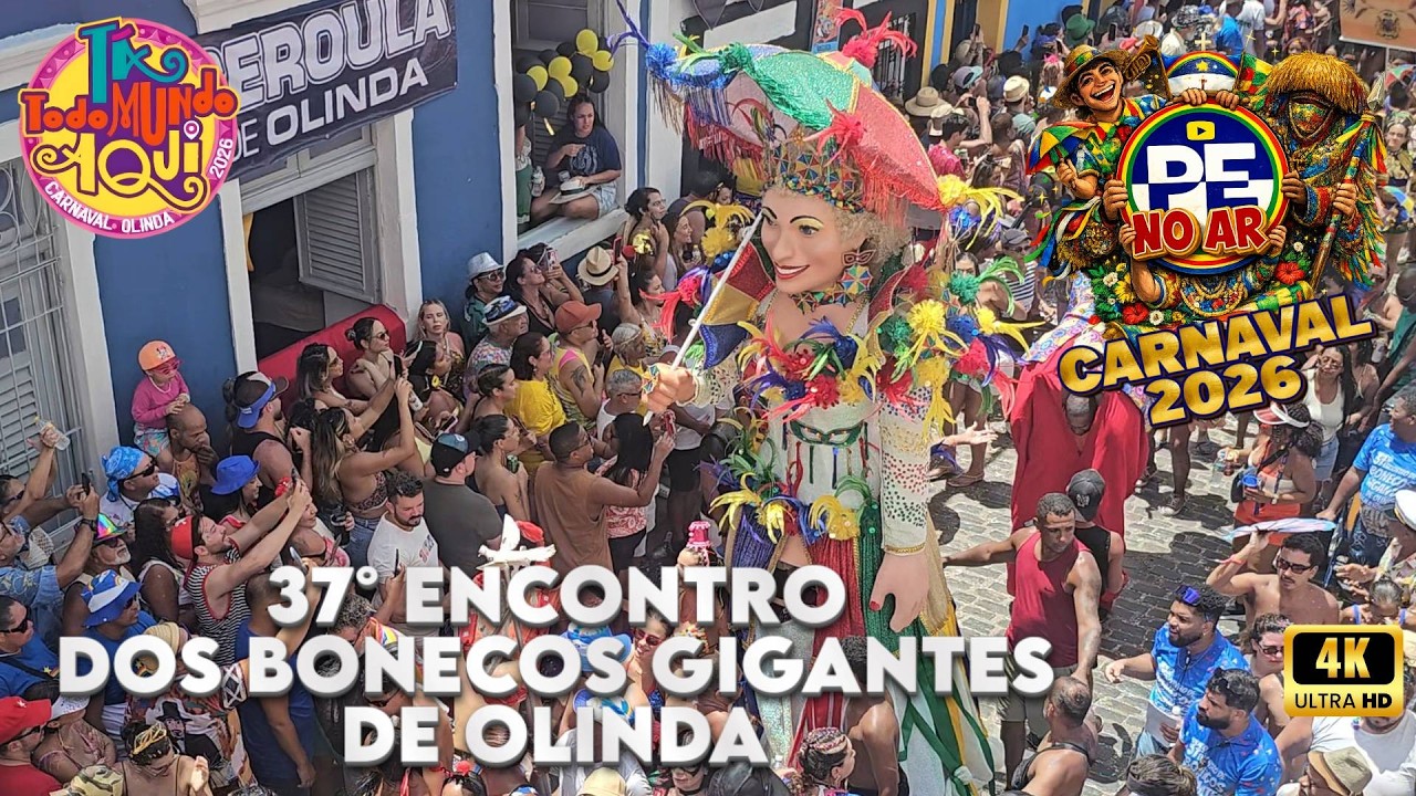 [CARNAVAL 2026] ​O ENCONTRO ÉPICO: 37° DESFILE DE BONECOS GIGANTES COM A MULHER DA SOMBRINHA!
