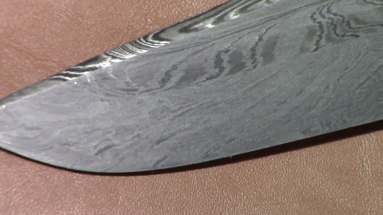 2)  Coltello damasco piuma-ritorto   forgiatura lama sgrossatura