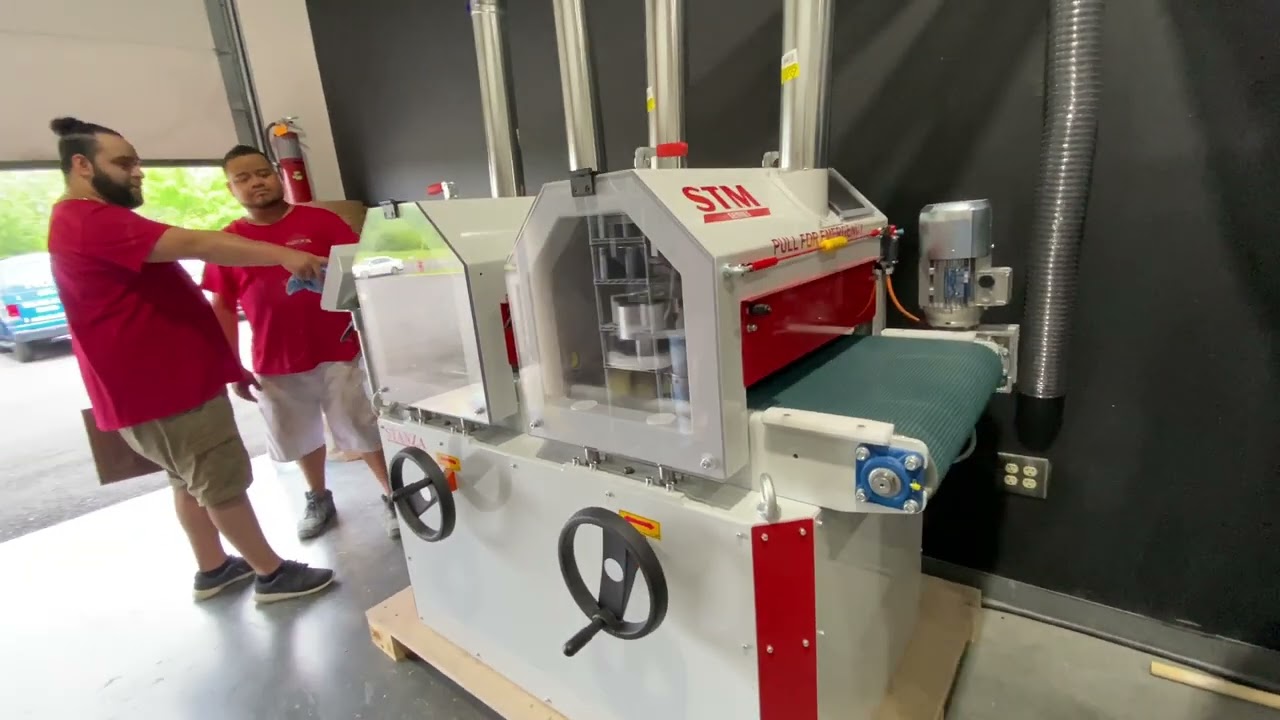 Sanding cabinet doors with Stanza machinery.