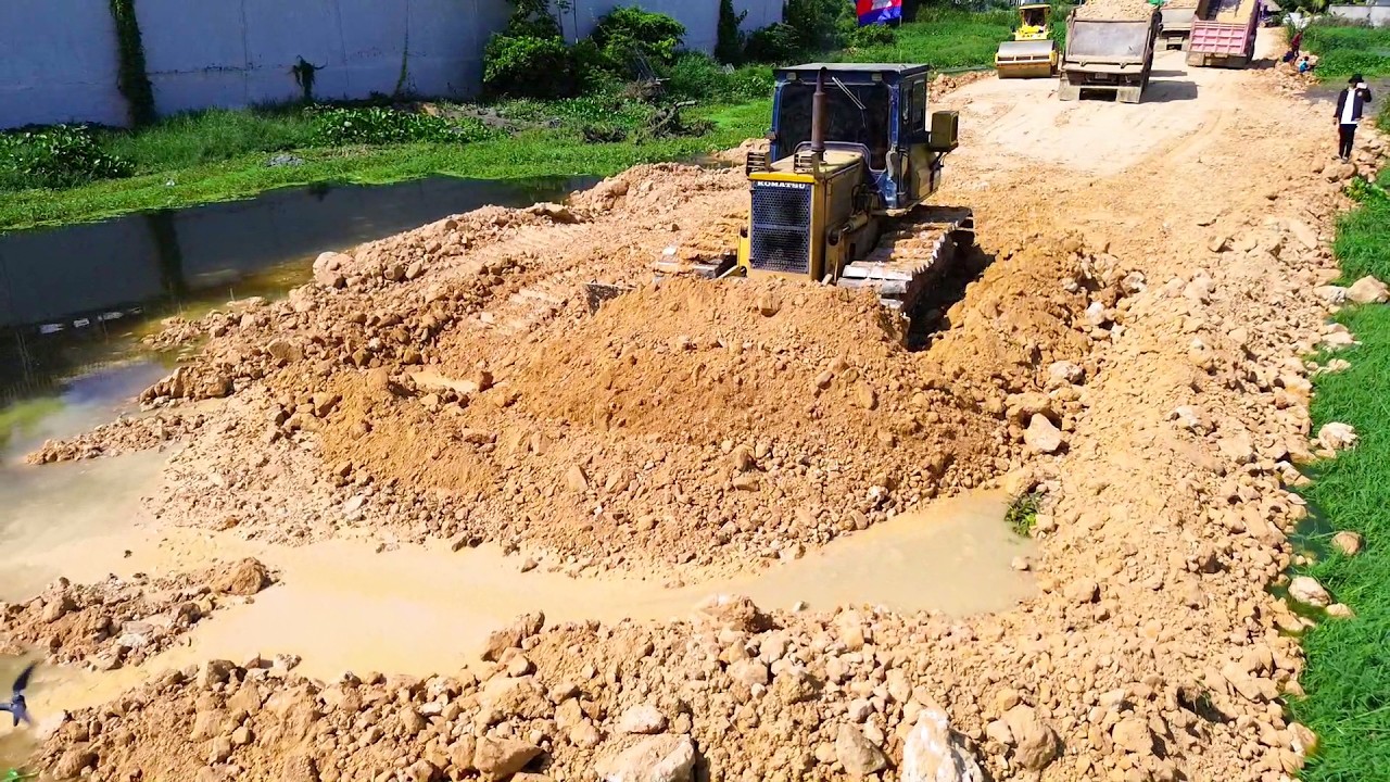 Unbelievable! Komatsu D58P Bulldozer Pushing Stones into Water for New Road