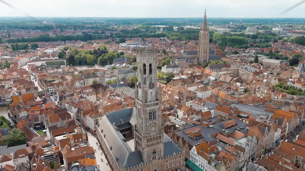 Bruges, Belgium. Belfort - Medieval bell tower and market square. Panorama of the city center fro...