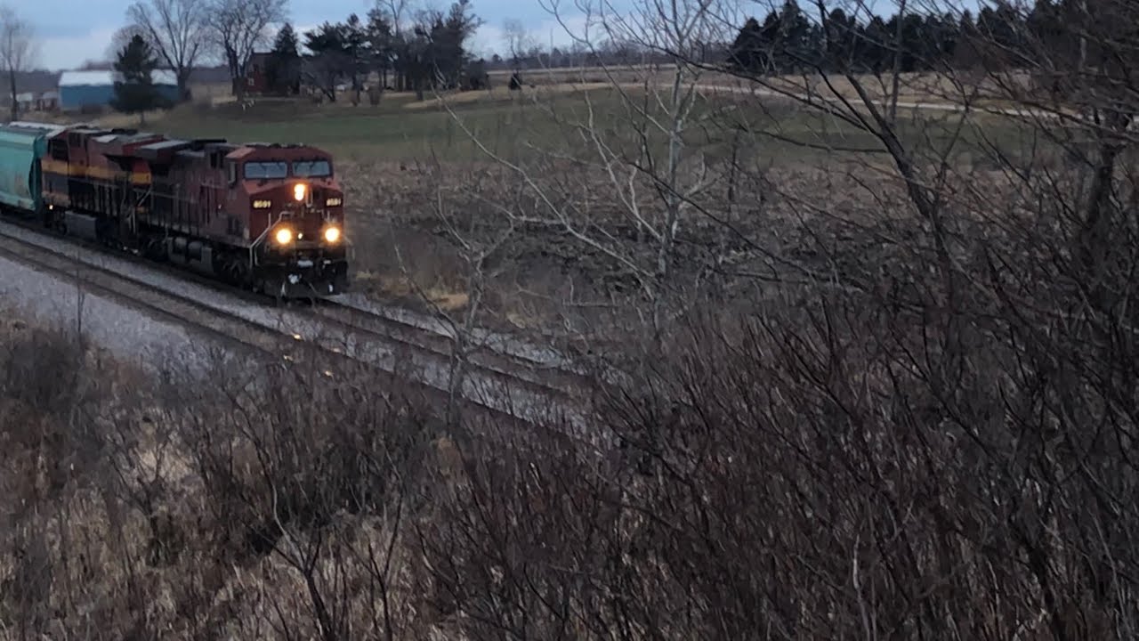CPKC Mixed Freight Train Passes By