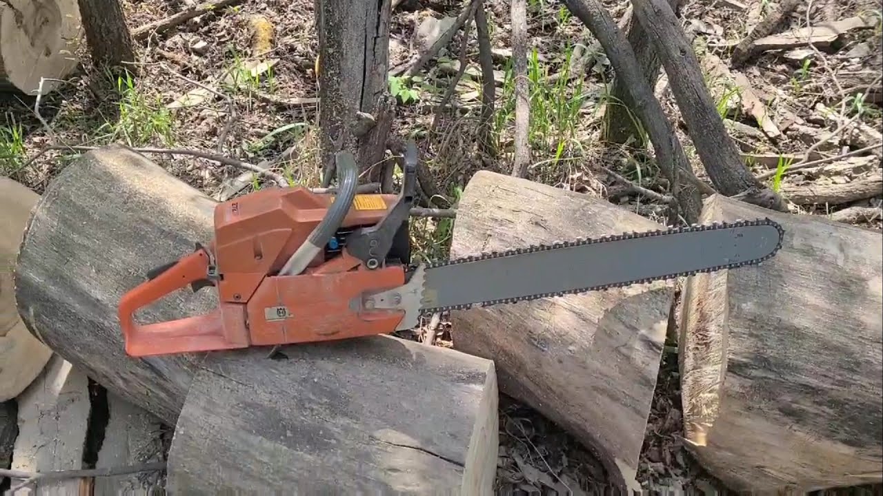 Ported Husqvarna 272xp, cutting a large blowdown.