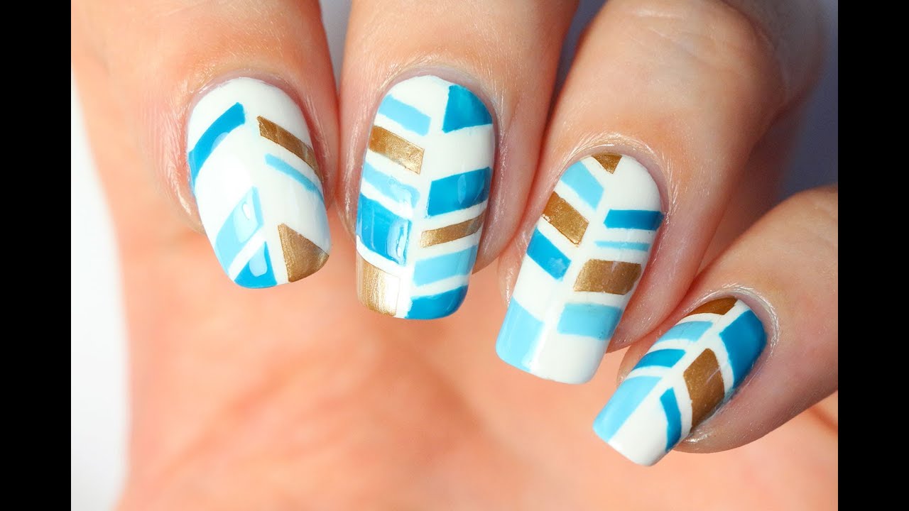 Nail art au striping tape : Plume indienne