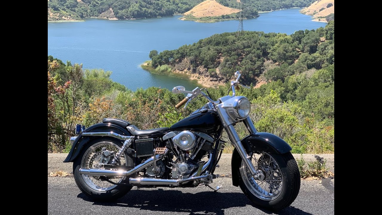 1974 Harley-Davidson Shovelhead FLH Electra-Glide riding through San Francisco across 3 Bridges.
