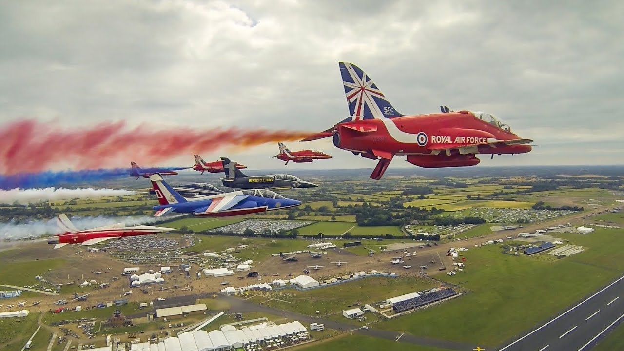 The Red Arrows 50th Anniversary Flypast with The Patrouille Suisse Leader
