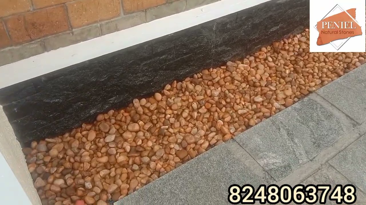 Naturally beautiful our nature stone with artificial grass and border design 