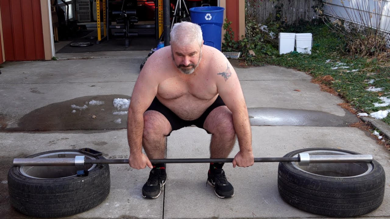 Old Man Learning To Deadlift And Tire Squats