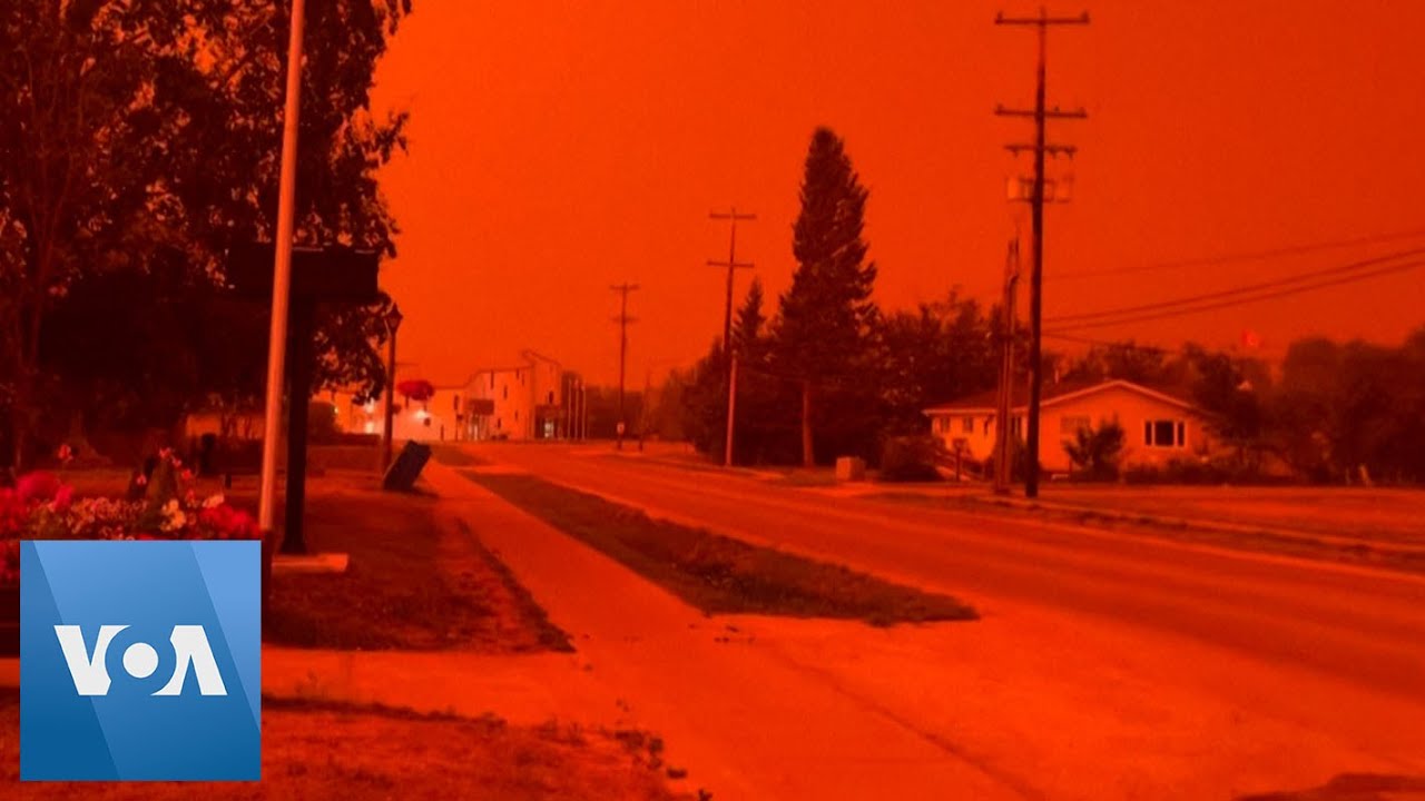 Wildfires Turn Skies Red in Canada | VOA News