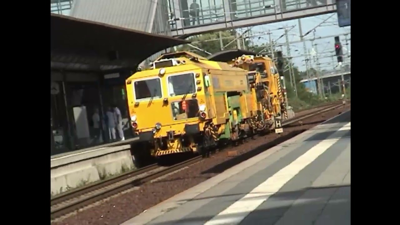 Plasser & Theurer 09 3X track tamping machine passes the station  #plassertheurer #trainspotting
