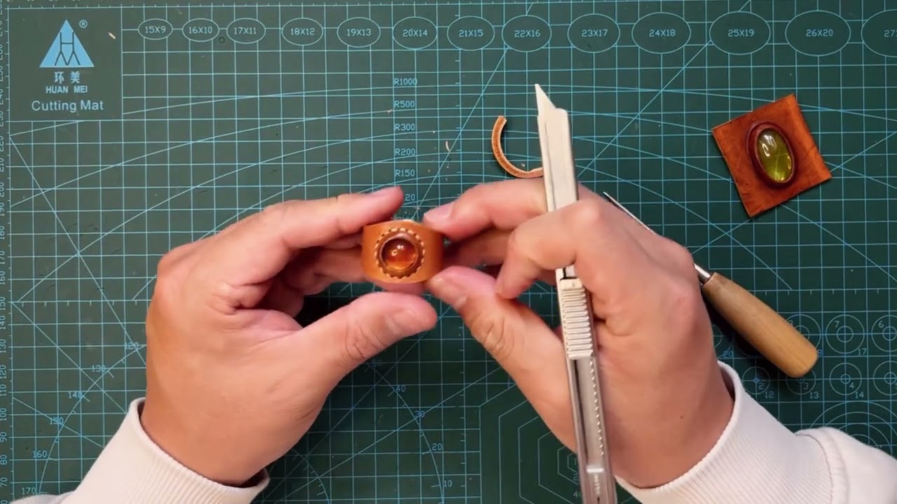 Crafting an amber-set leather ring