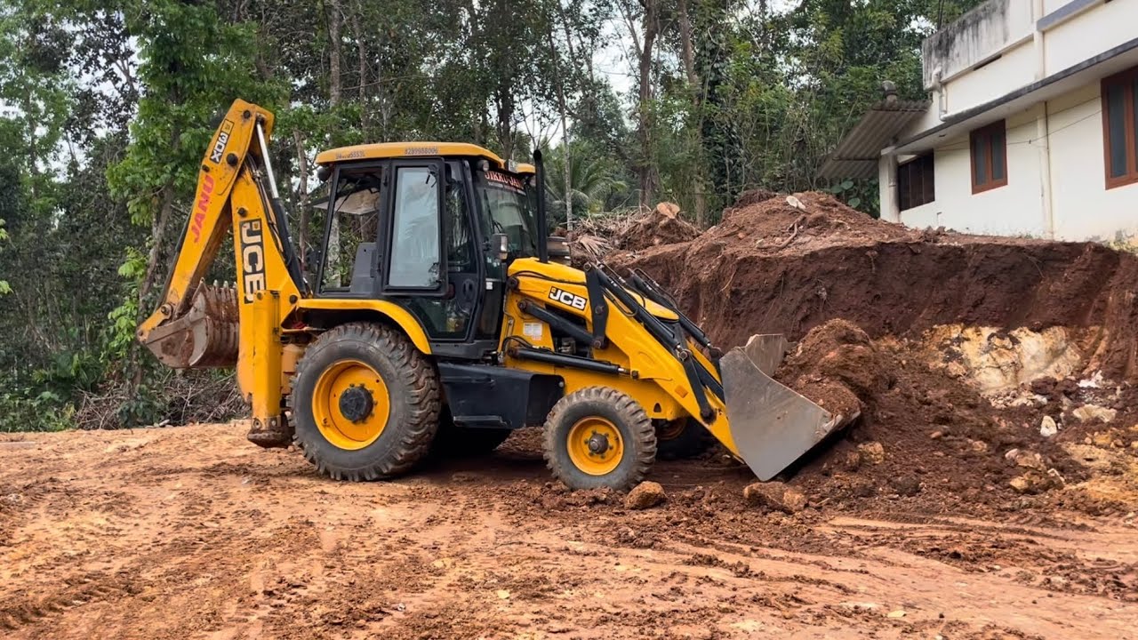Jcb 3dx dozing and collecting soil to make soil heap at entrance of plot #jcb #jcb3dx #jcbvideo 