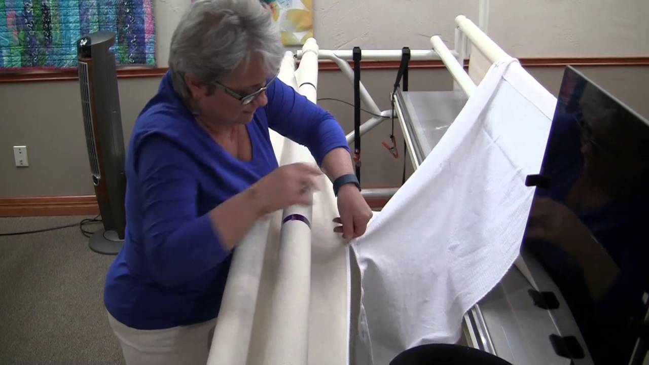 How to mount your quilt onto an APQS longarm quilting machine at our studio.