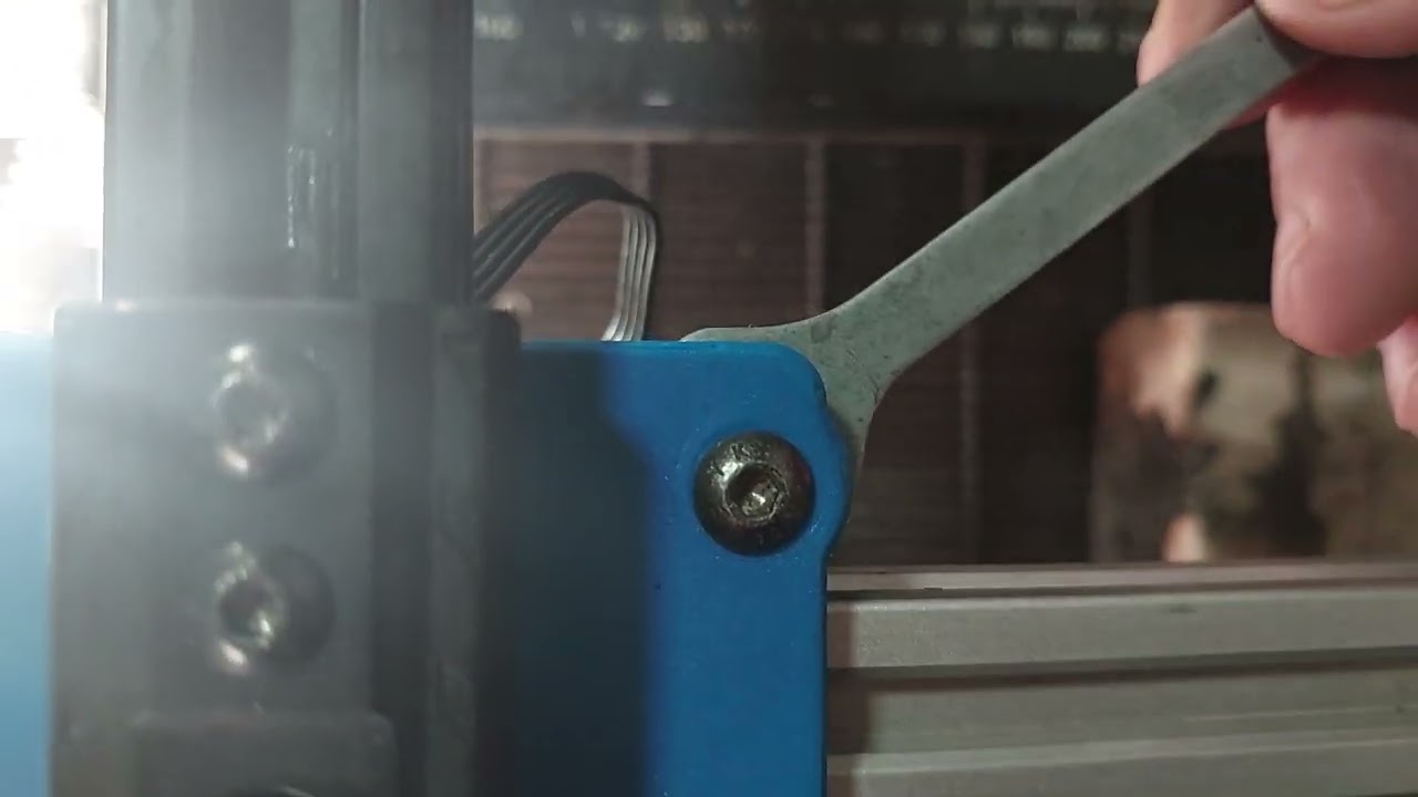 Como tirar a folga da  roldana da gravadora laser TTS-10.