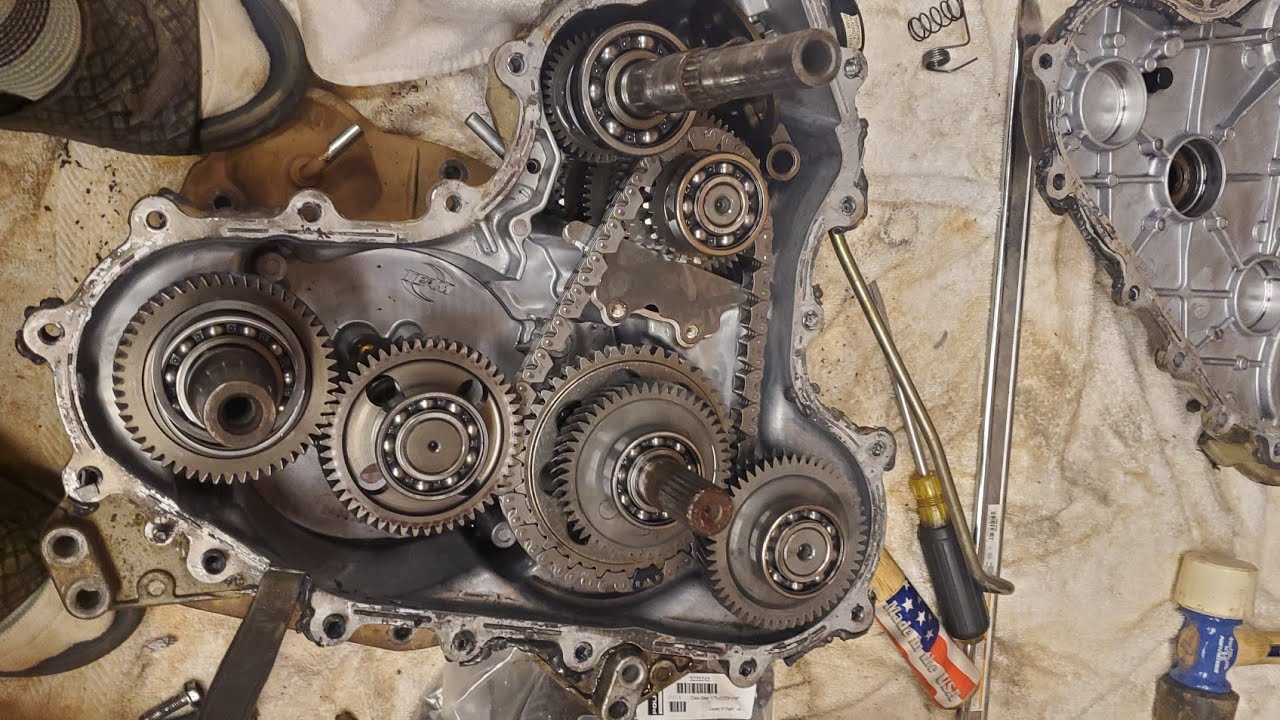 sportsman 850 gear swap/ gear reduction reverse chain upgrade and drive chain upgrade