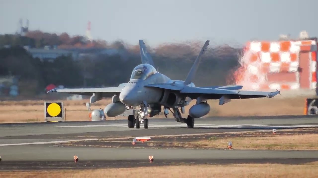 US Marines VMFA(AW)-242 Bats F/A-18D take off