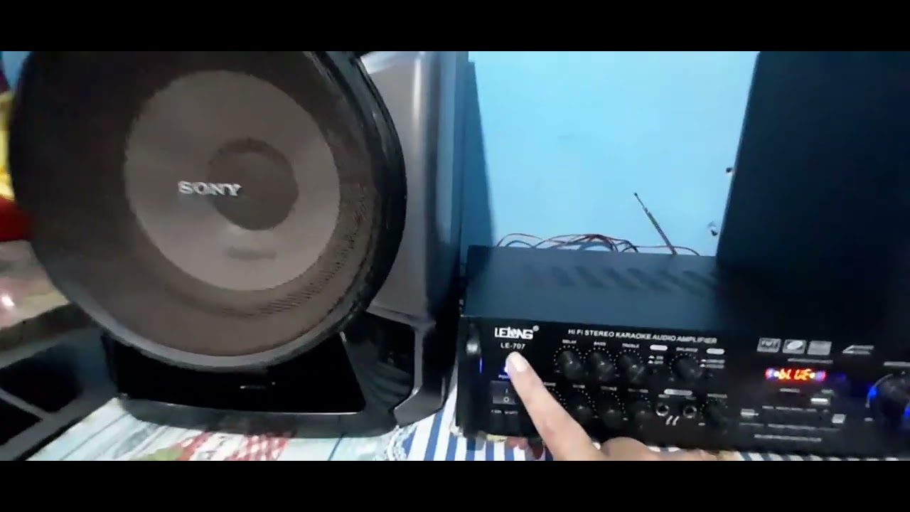 caixa sony tocando amplificador lelong le 707