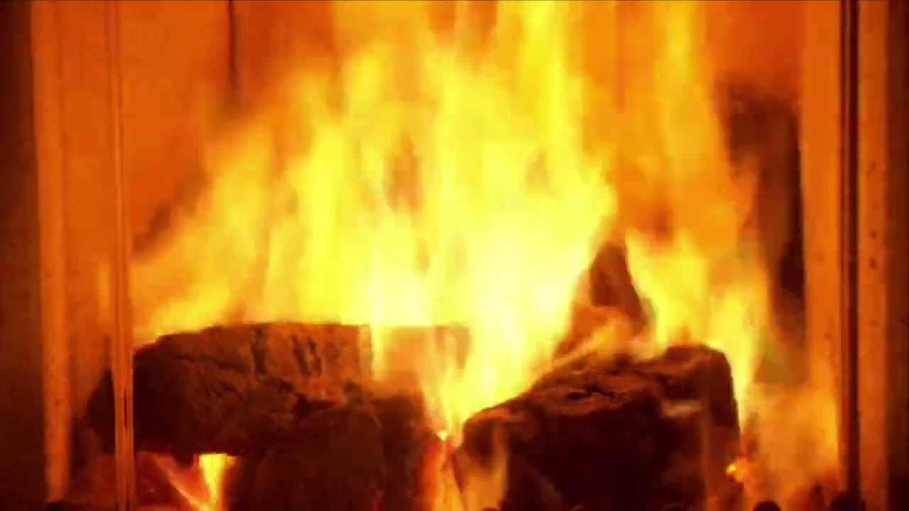 A fireplace with a flickering flame, crackling logs, and warm light.