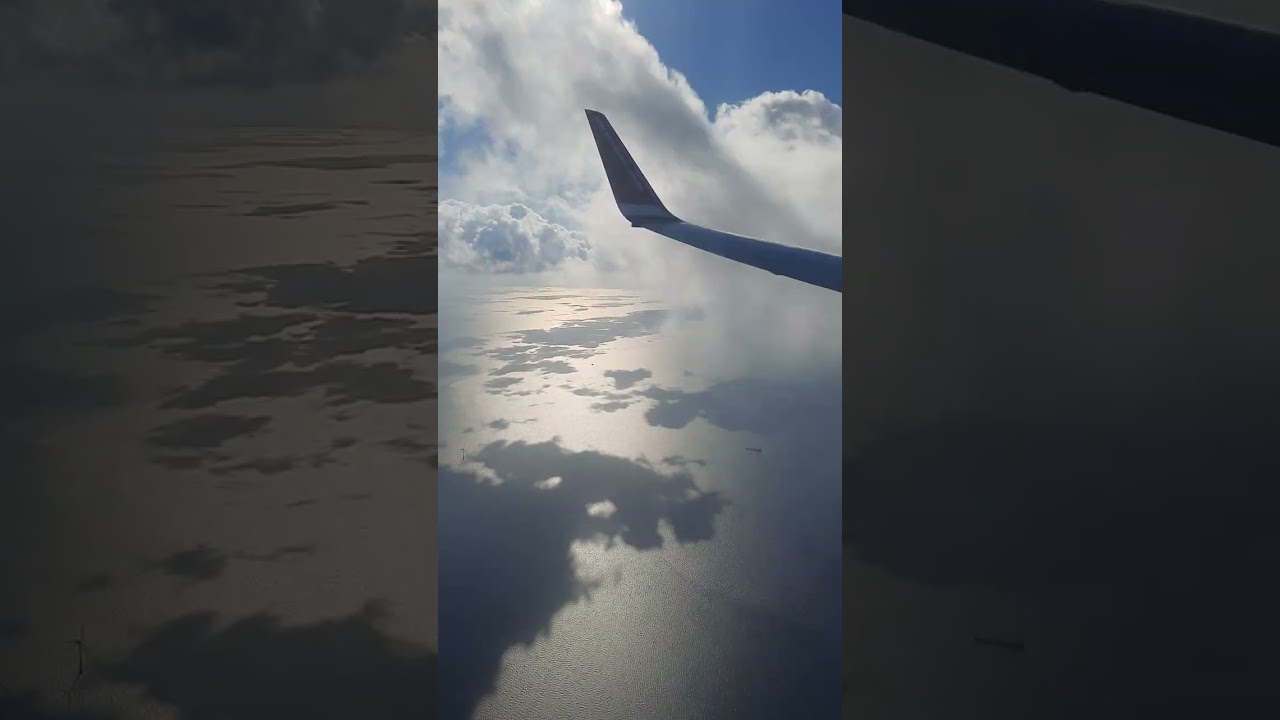 🌌 Mid-Air Majesty: Norwegian Air's Flight Between Denmark & Sweden