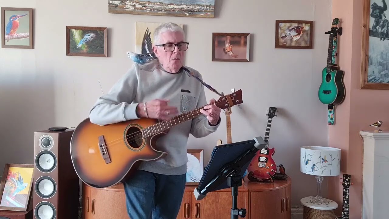 I'm On Fire on an Ozark Tenor Guitar (Please click on more for the chords and lyrics.)