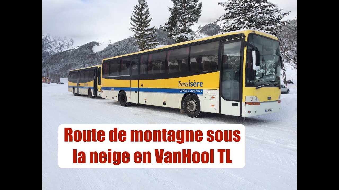 Une route de montagne et de la neige au volant d'un Van Hool TL