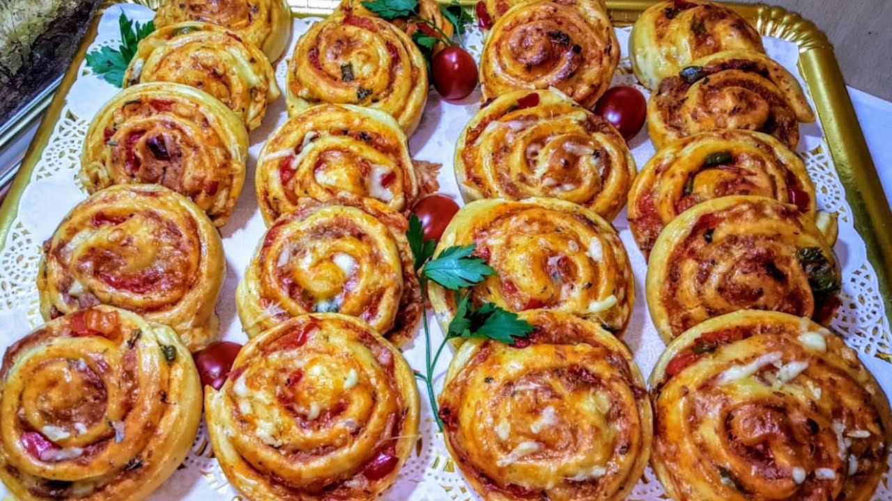 فطاءر رولي/شنيك مالح حشوة البيتزا 🍕عجين مجربتيهش من قبل خفيف بحال الريشة👍