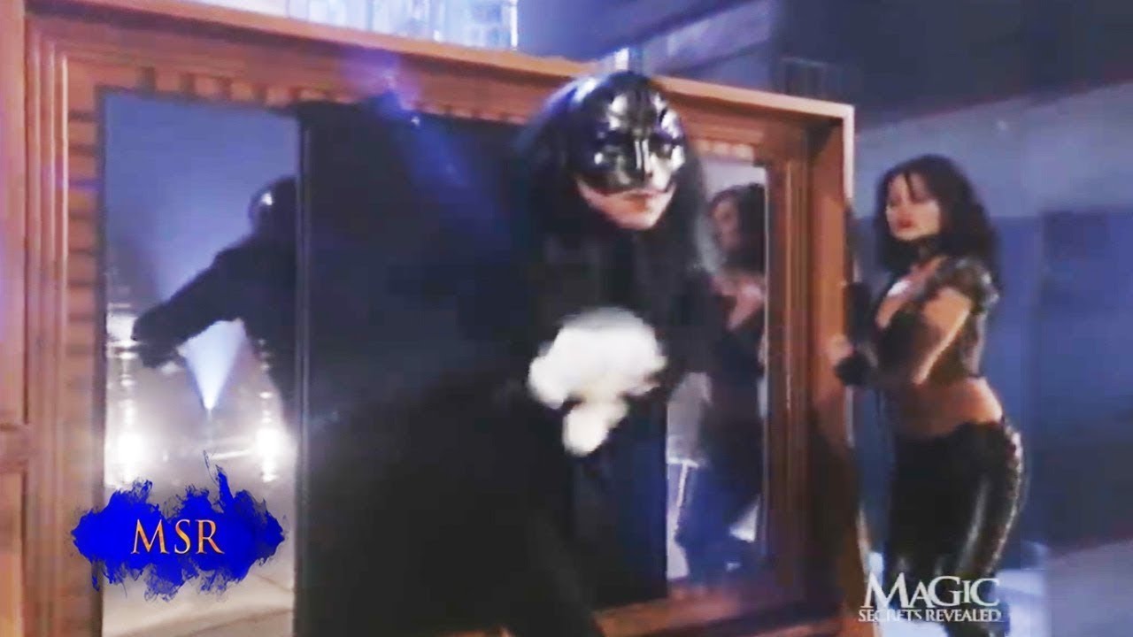 MAGICIAN PASSES THROUGH SOLID MIRROR!