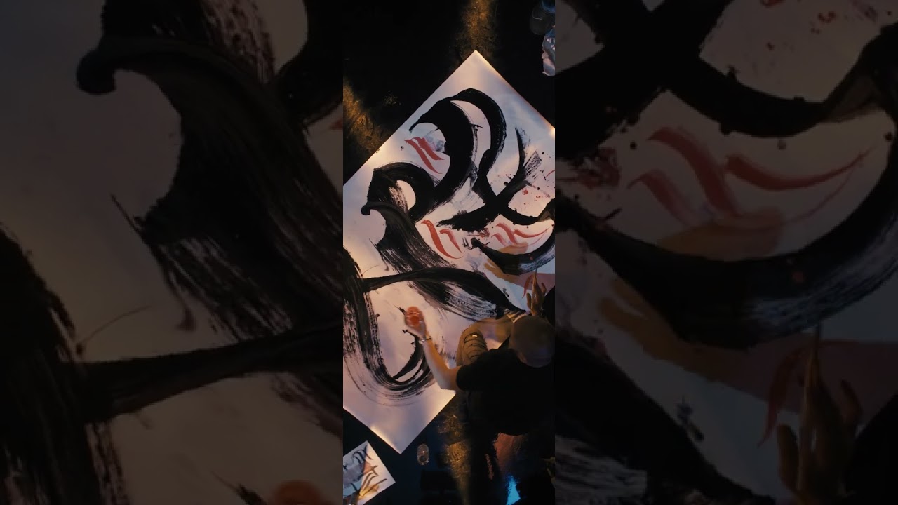 Award-Winning Artist Aerosyn-Lex Mestrovic Painting at Our Studio.