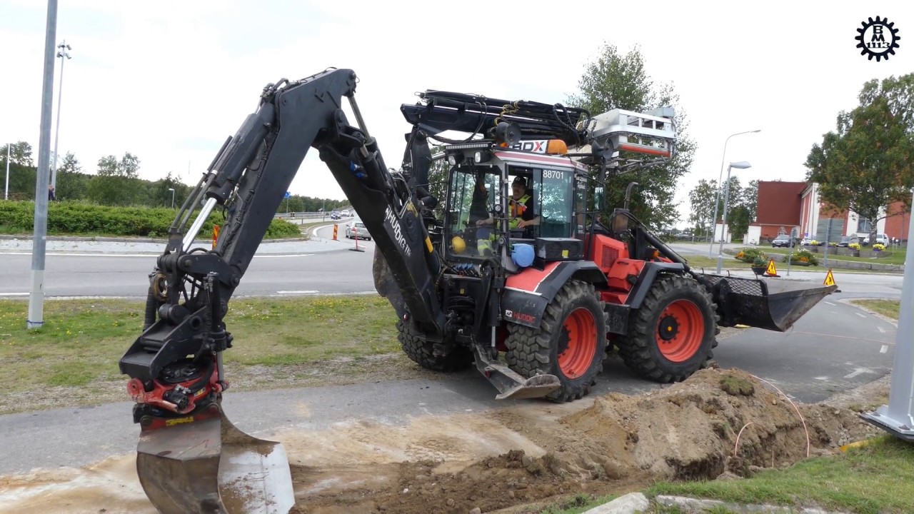 Huddig 1160 with Rototilt R4  in cabel work