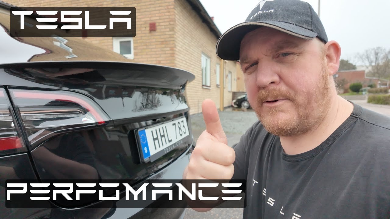 Monterar original kolfiber spoiler på Tesla Model 3