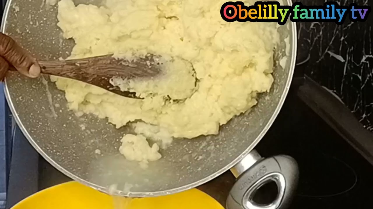Preparing dinner for the family vegetables soup and semolina fufu 