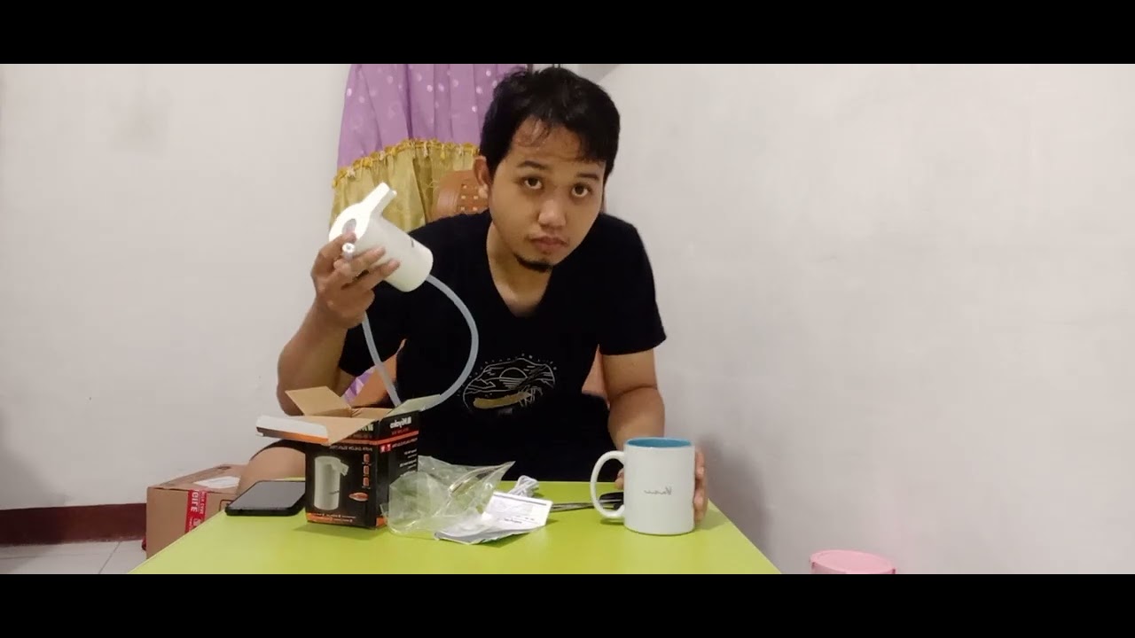 Unboxing dispenser galon