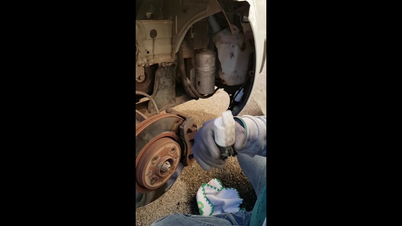 Changement pompe à essuie-glace Scénic 2