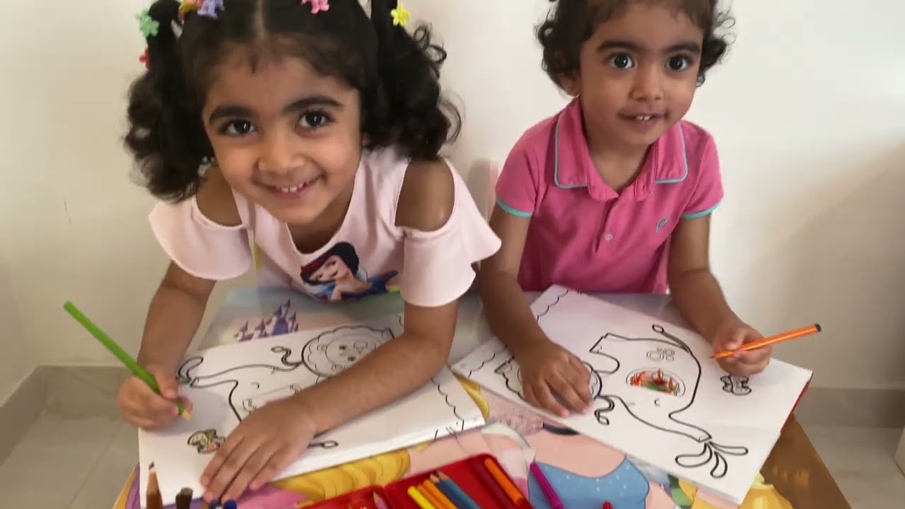 Sheikha and salama enjoying coloring