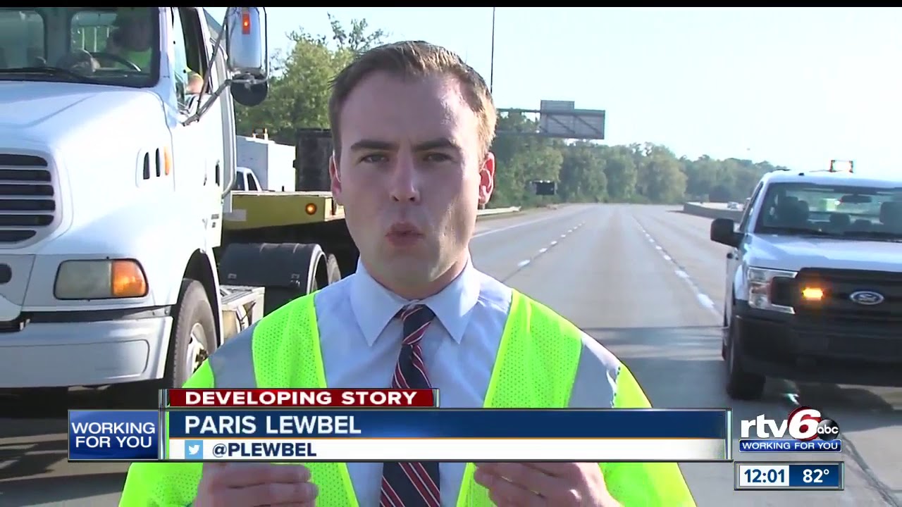 Dump truck crashes into electronic sign on I-70