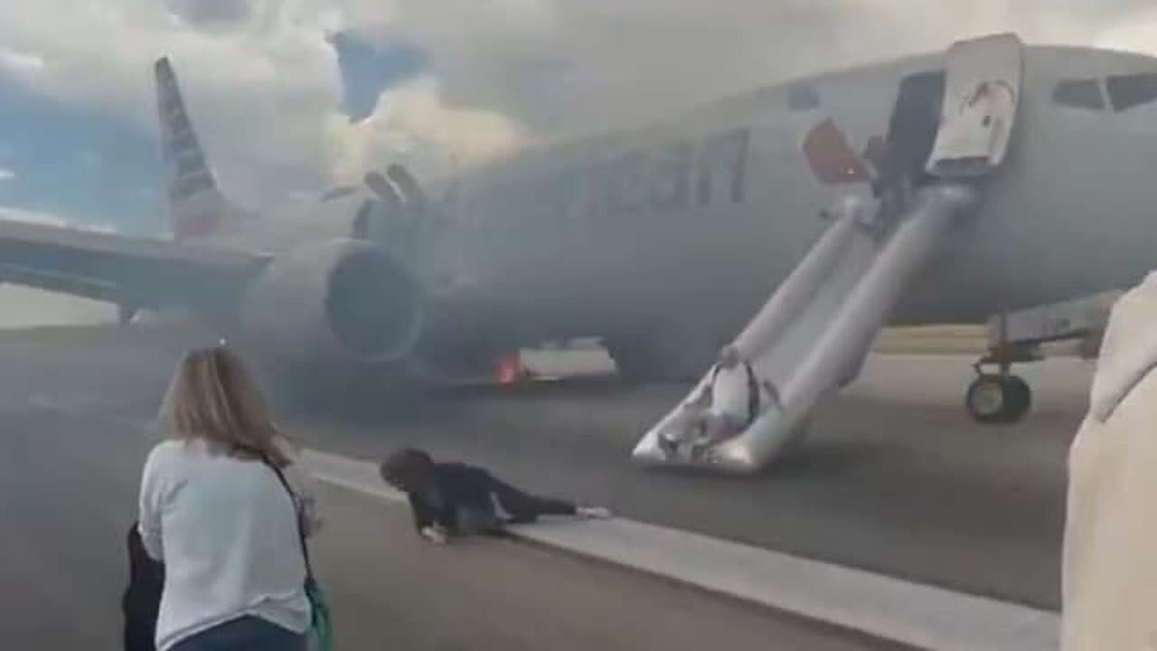 American Airlines Plane Tyre Catches Fire At Denver Airport Passengers Evacuated  Video
