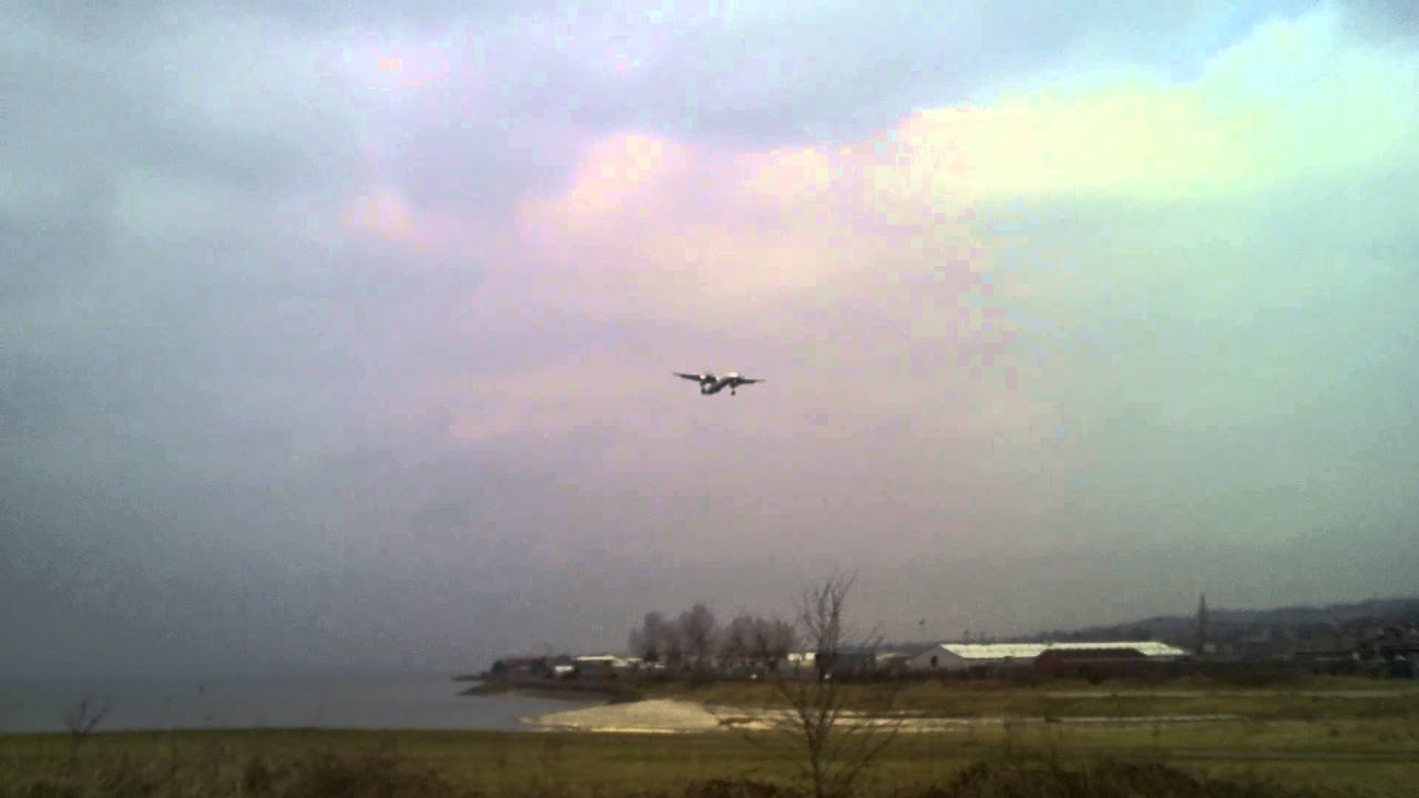 Flybe Dash 8 Q400 lands at George best belfast city airport